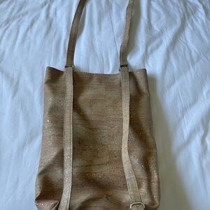 Cork purse that can be worn as a backpack or shoulder bag.